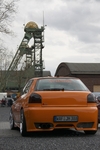 TuneUp-Meeting Zeche Westfalen in Ahlen. Schwarz-Oranger Audi 3 vor Förderturm